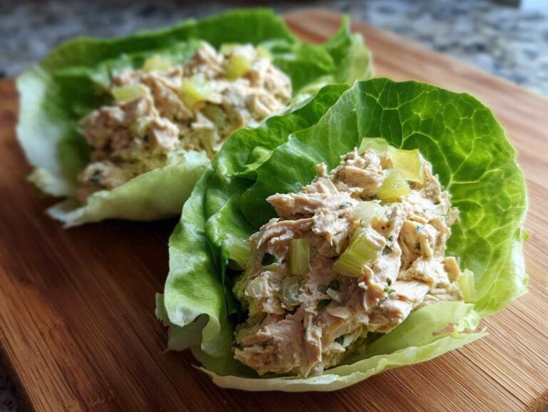 Two servings of creamy tuna salad mixed with celery served in crisp lettuce cups, demonstrating an Easy Easiest Way Eat Healthy.
